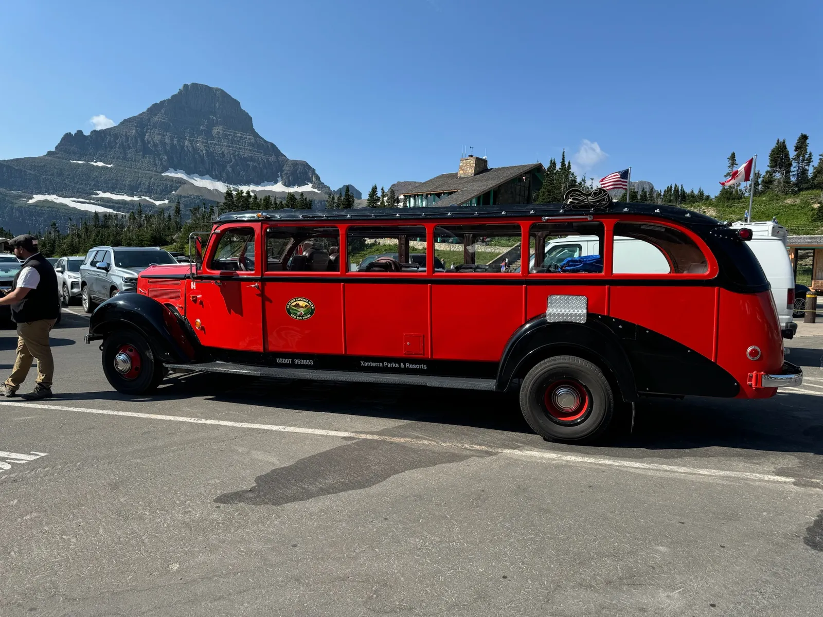 Bus 84 in 2024 at Logan Pass, Reynolds Mountain behind